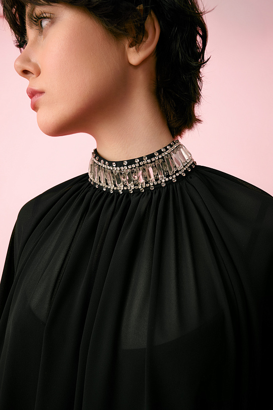 The dress is black