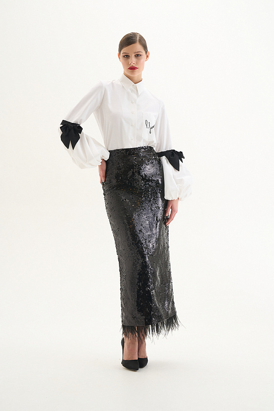 White cotton blouse with voluminous sleeves